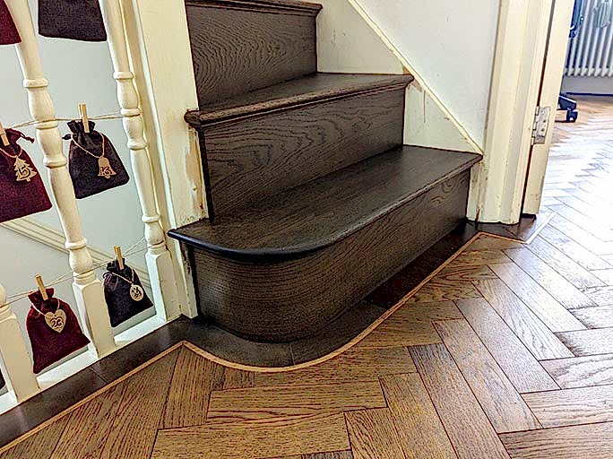  An elegant curved border around the bottom step, formed from the same engineered oak #CraftedForLife