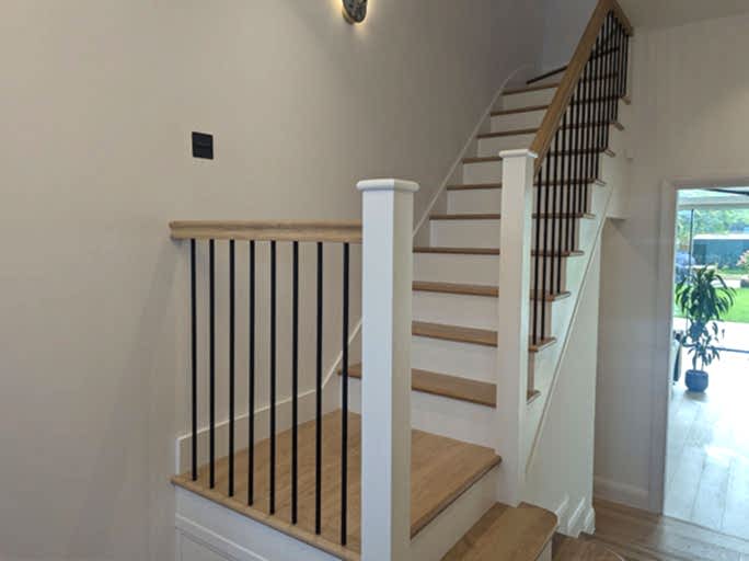Custom made engineered oak staircase in a naturally light oak colour #CraftedForLife
