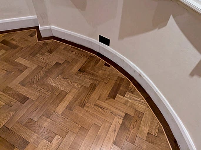 The flooring was expertly curved to follow the natural contour of the bay window #CraftedForLife